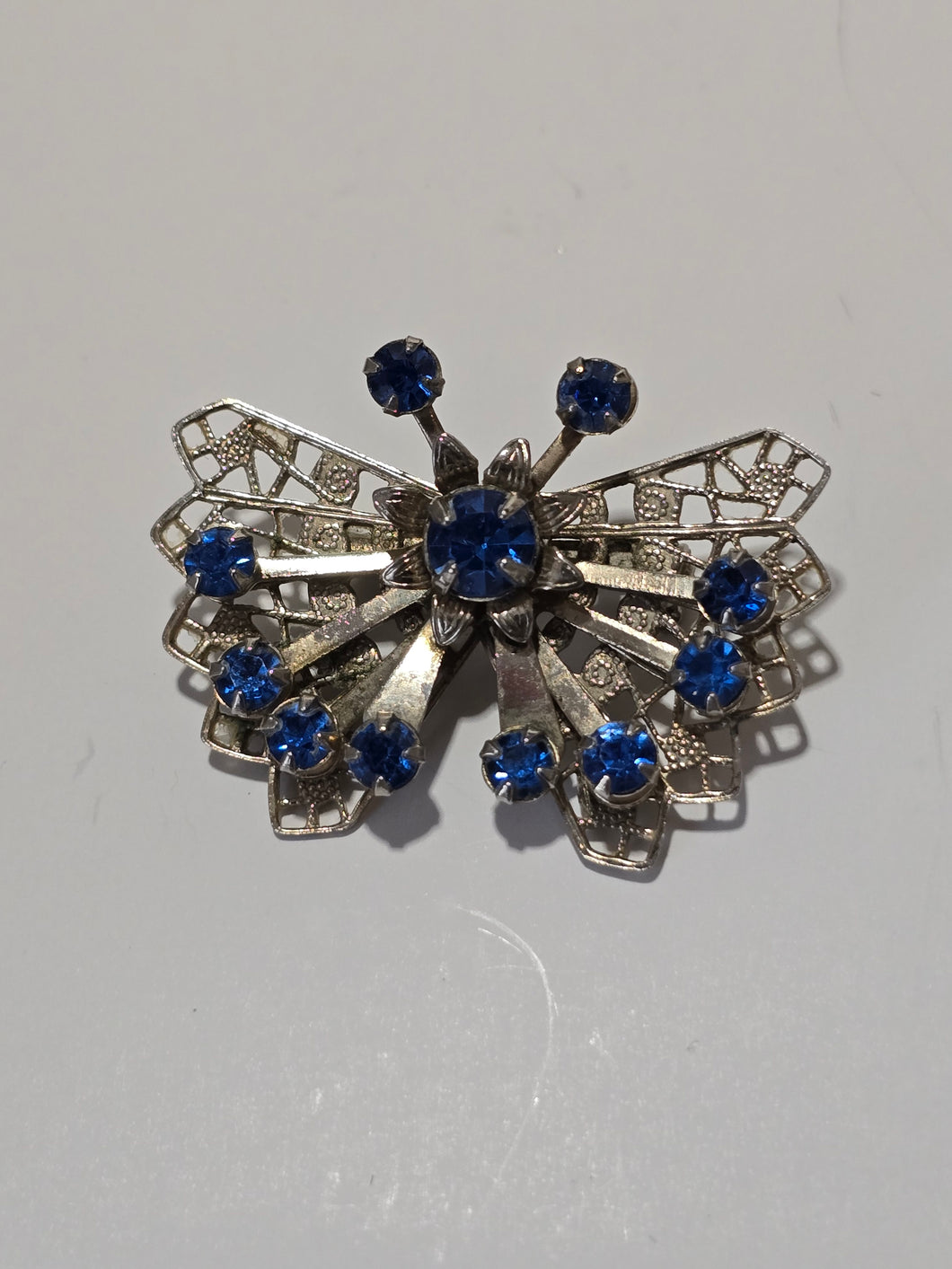 Blue butterfly brooch
