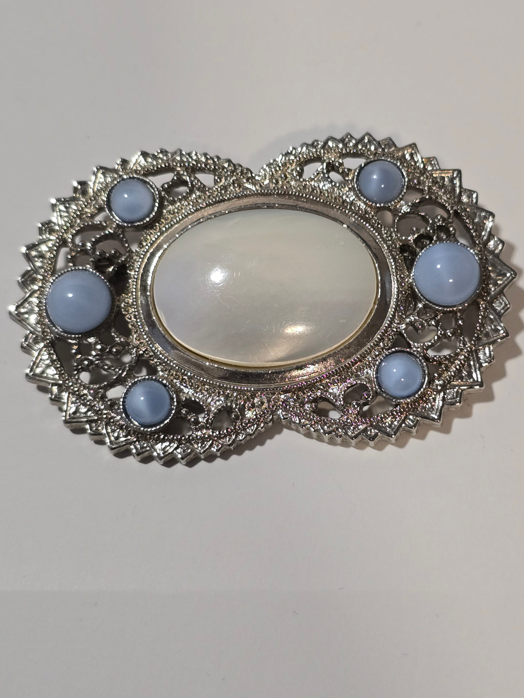 Faux pearl brooch