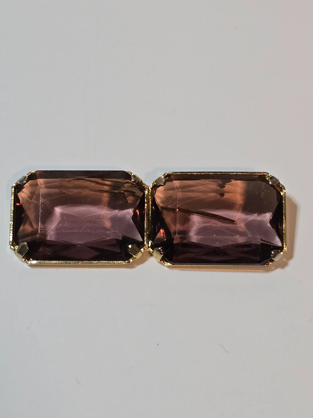 Amethyst color brooch