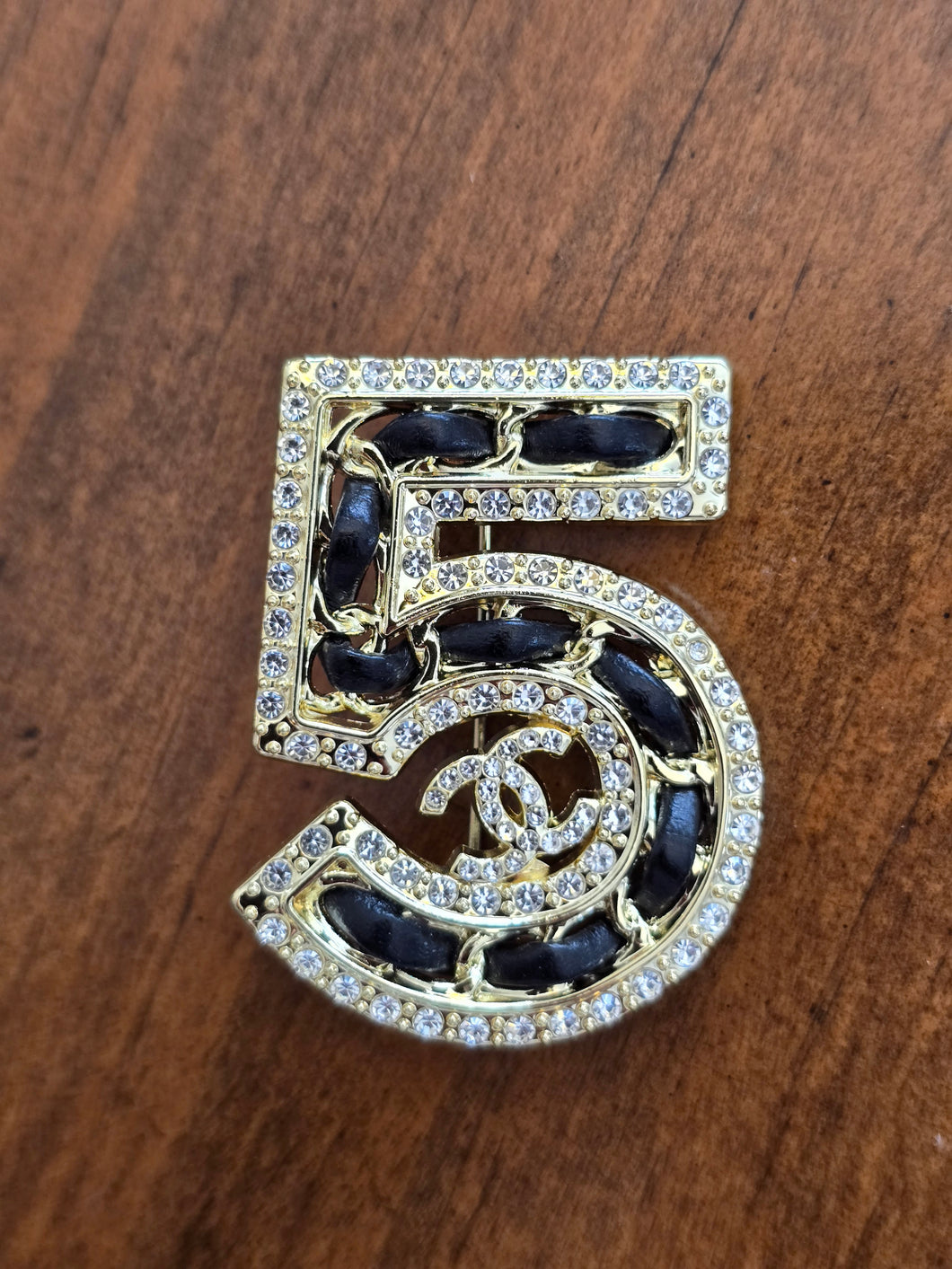 Chanel 5 brooch