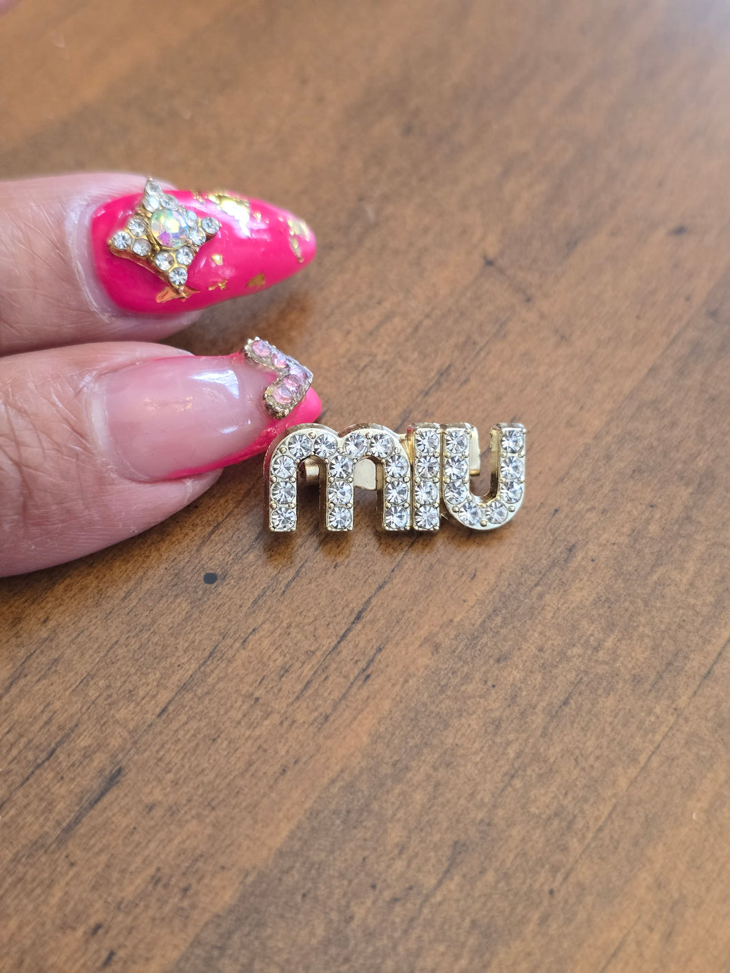Miu brooch