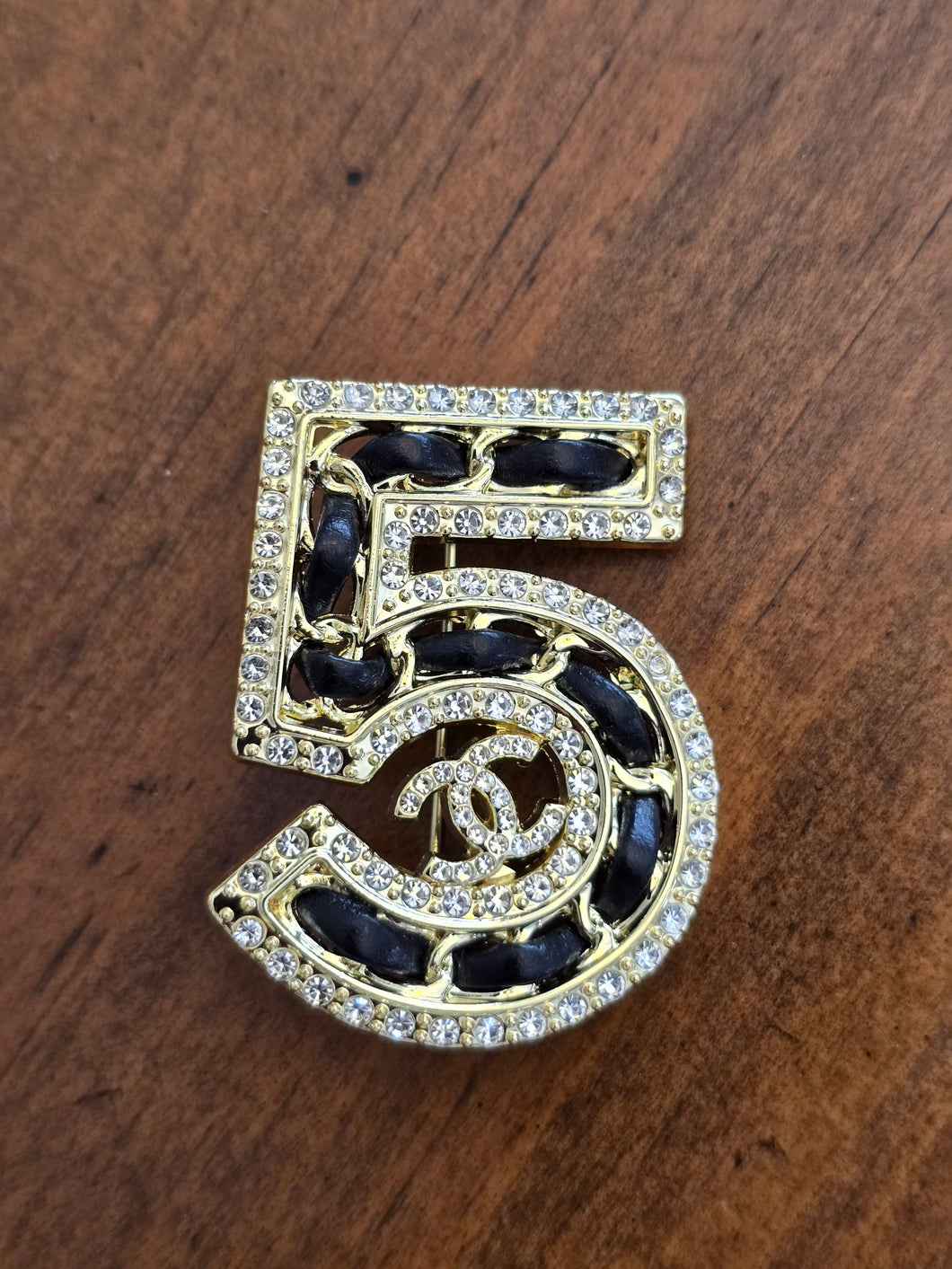 Chanel 5 brooch