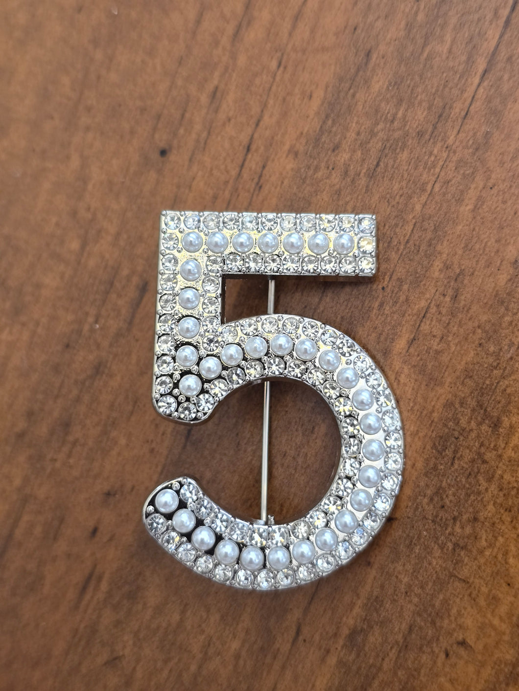Chanel 5 brooch